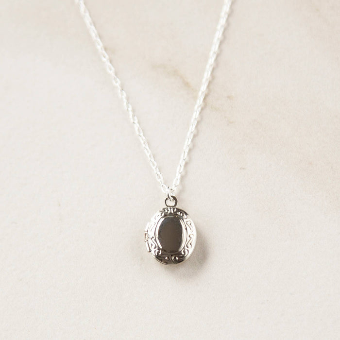 Stowaway Jewelry - Tiny Silver Oval Locket Necklace