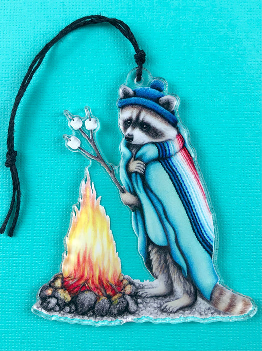 Abundance Illustration - Holiday ornament raccoon roasting marshmallows